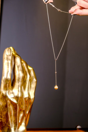 Beautiful golden jewelery with precious stones and diamonds