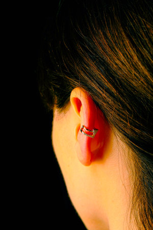 Beautiful golden jewelry with precious stones and diamondsの写真素材