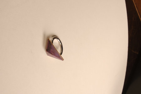 Ring on the paper. Jewelry background.の写真素材