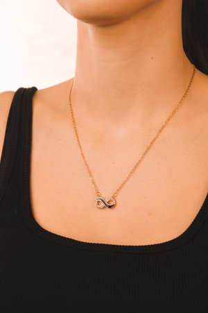 Beautiful golden jewelry with precious stones and diamondsの写真素材