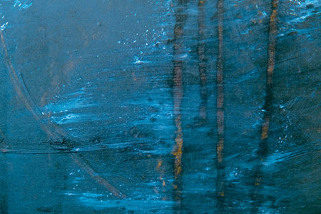 abstract blue background texture of oil paint on canvas with cracks and scratches