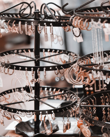 Handmade bracelets for sale in a shop window, close upの写真素材