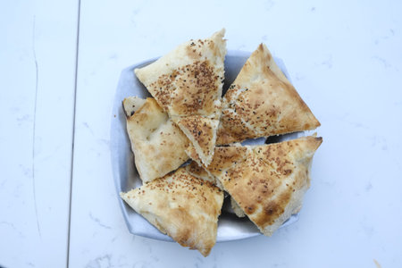 Pieces of a savory snack on a white background. Selective focus.