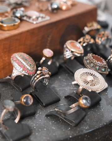 Jewelry on display in a shop window, close-up