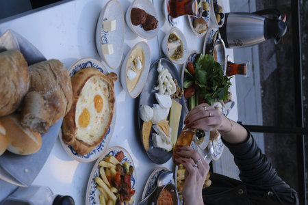 Breakfast table with a variety of appetizers and croissantsの写真素材