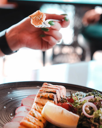 Salmon and salmon steak on a plate in a restaurant. Restaurantの写真素材