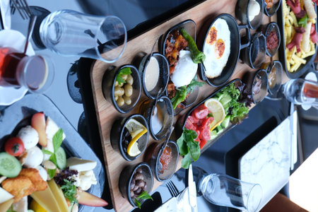 Tray with delicious food on table, closeup. catering serviceの写真素材