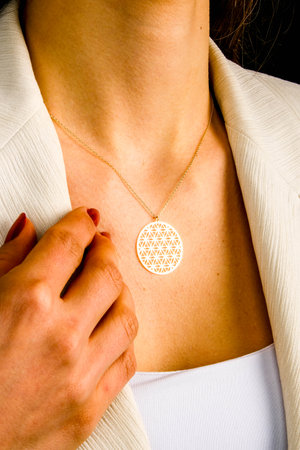 Beautiful golden jewelery with precious stonesの写真素材