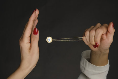 Beautiful golden jewelery with precious stones and diamondsの写真素材