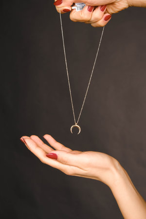 Beautiful golden jewelry with precious stones and diamondsの写真素材