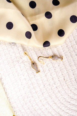 Beautiful golden jewelry with precious stones and diamonds