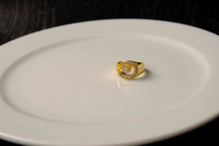 Beautiful golden jewelry with precious stones and diamonds