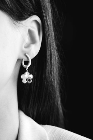 Silver Earring with Flower Designの写真素材