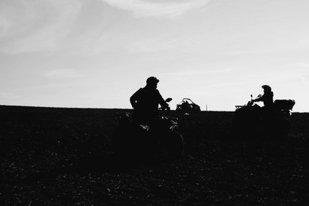 helmet sitting on atv quad bikeの写真素材
