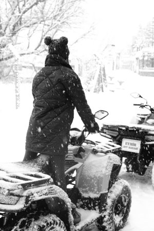 helmet sitting on atv quad bikeの写真素材