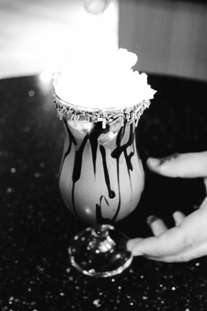 A cozy corner with a steaming cup of coffeeの写真素材