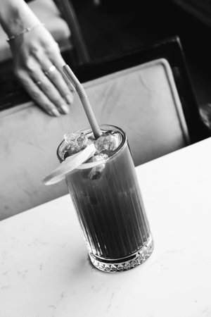 A cozy corner with a steaming cupの写真素材