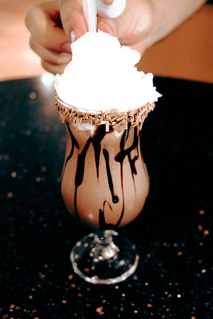 A cozy corner with a steaming cup of coffeeの写真素材