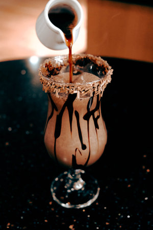 A cozy corner with a steaming cup of coffeeの写真素材