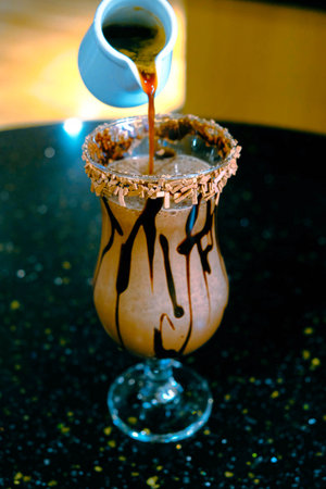 A cozy corner with a steaming cup of coffeeの写真素材