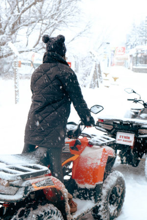 helmet sitting on atv quad bikeの写真素材