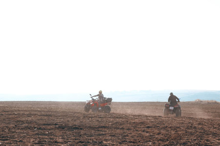 helmet sitting on atv quad bike in mountains