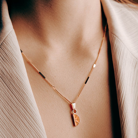 Elegant Gold and Diamond Pendant Necklacesの写真素材