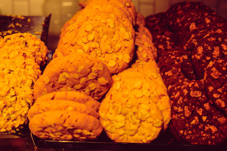 Group of associated cookies. Chocolate chip, oatmeal raisin, white chocolateの写真素材