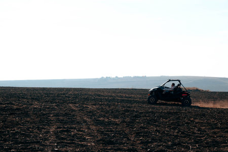 helmet sitting on atv quad bike in mountains