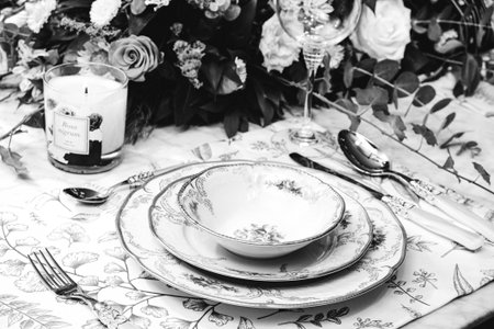 beautiful plate and fresh perfect colorful flowers standing on luxury table