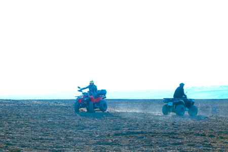 helmet sitting on atv quad bikeの写真素材