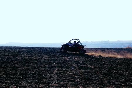 helmet sitting on atv quad bikeの写真素材