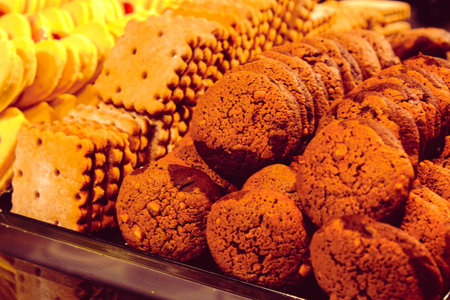 Group of associated cookies. Chocolate chip, oatmeal raisin, white chocolateの写真素材