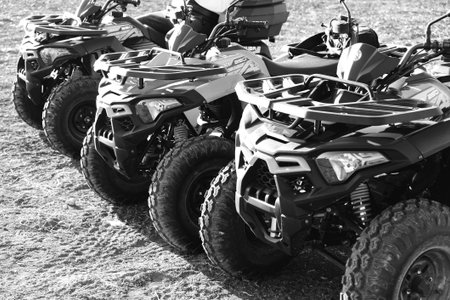 helmet sitting on atv quad bikeの写真素材