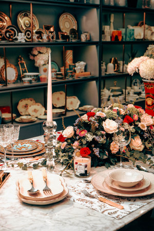beautiful plate and fresh perfect colorful flowers standing on luxury table