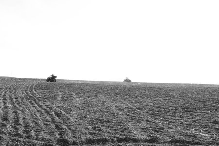 helmet sitting on atv quad bike in mountainsの写真素材