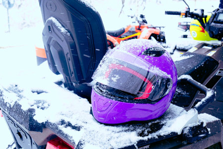 helmet sitting on atv quad bikeの写真素材