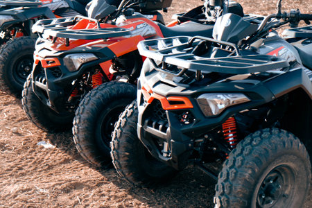 helmet sitting on atv quad bike in mountainsの写真素材