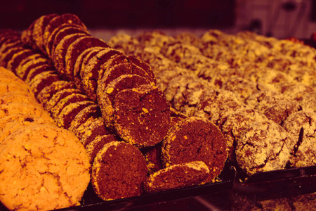 Group of associated cookies. Chocolate chip, oatmeal raisin, white chocolateの写真素材