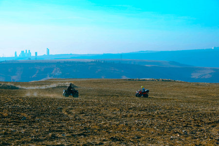 helmet sitting on atv in mountainsの写真素材