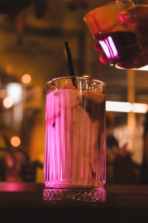 A cozy corner with a steaming cup of coffeeの写真素材