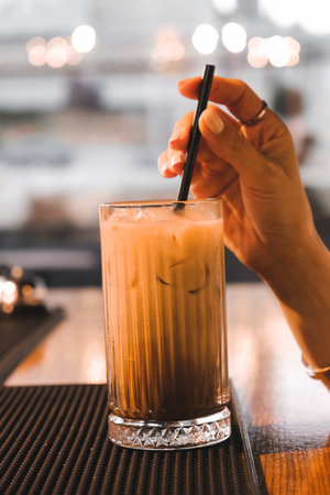A cozy corner with a steaming cup of coffeeの写真素材