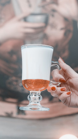 A cozy corner with a steaming cup of coffeeの写真素材