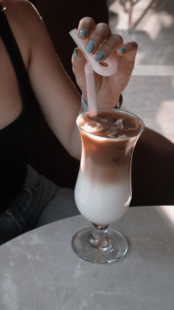 A cozy corner with a steaming cup of coffeeの写真素材