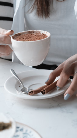 Relaxing coffee break with a hot drinkの写真素材