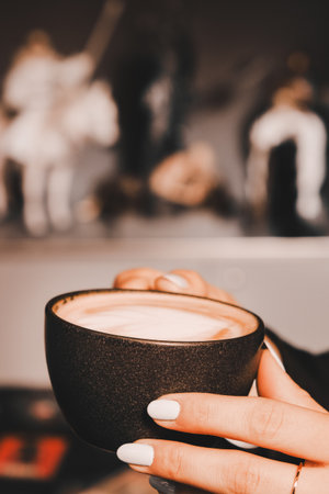 A cozy corner with a steaming cup of coffeeの写真素材