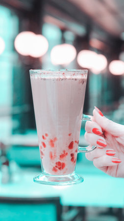 A cozy corner with a steaming cup of coffeeの写真素材