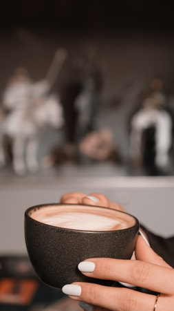 Freshly brewed coffee served in a stylish cupの写真素材