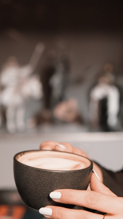 Freshly brewed coffee served in a stylish cupの写真素材