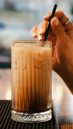 A cozy corner with a steaming cup of coffeeの写真素材